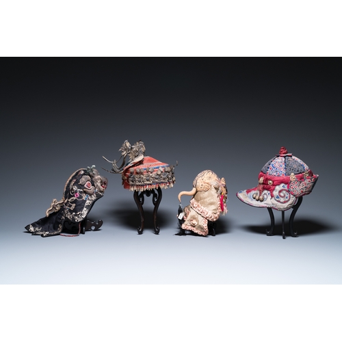 444 - Eight Chinese children's hats, 19/20th C.Dim.: 28 x 23 x 21 cm (the red hat)