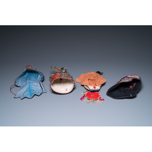 444 - Eight Chinese children's hats, 19/20th C.Dim.: 28 x 23 x 21 cm (the red hat)