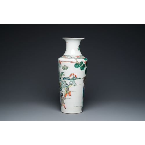 463 - A fine Chinese famille verte rouleau vase with narrative design, 19th C.H.: 58 cm