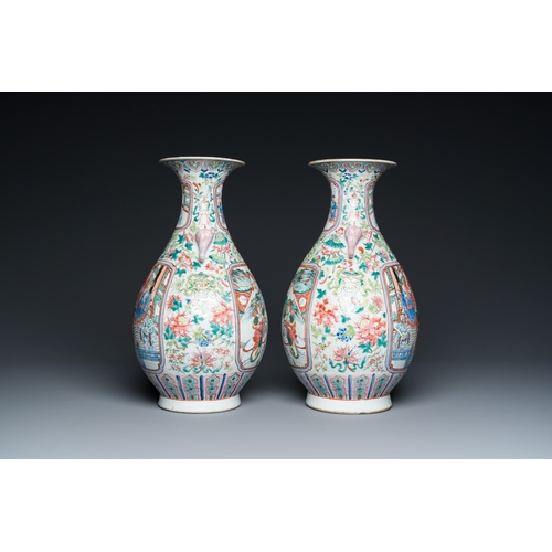 468 - A pair of Chinese famille rose vases with elephant handles, 19th C.H.: 40 cm