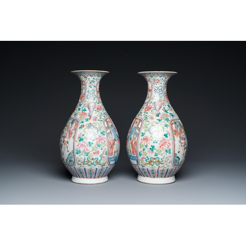 468 - A pair of Chinese famille rose vases with elephant handles, 19th C.H.: 40 cm