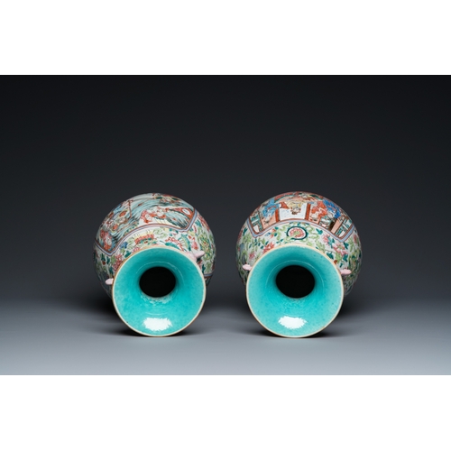 468 - A pair of Chinese famille rose vases with elephant handles, 19th C.H.: 40 cm