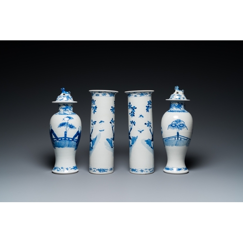 475 - A Chinese blue and white garniture of five vases with ladies and boys, Kangxi mark, 19th C.H.: 32,5 ... 