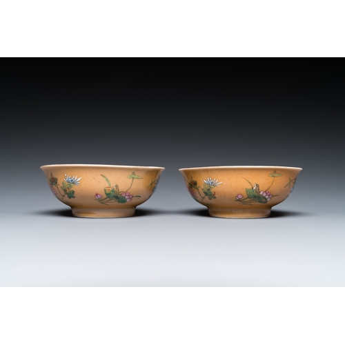 481 - A pair of Chinese cafe-au-lait-ground famille rose 'grasshopper' bowls, Daoguang mark and of the per... 