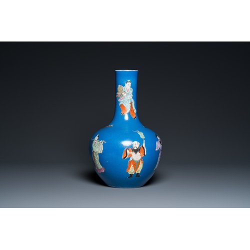 505 - A Chinese blue-ground famille rose 'eight immortals' bottle vase, Qianlong mark, 19th C.H.: 38,5 cm... 