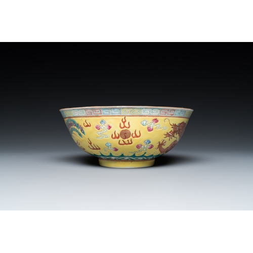 506 - A Chinese yellow-ground famille rose 'dragon and phoenix' bowl, Guangxu mark and of the periodDia.: ... 