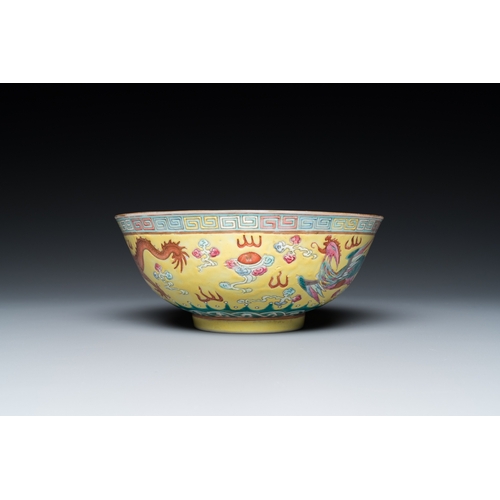 506 - A Chinese yellow-ground famille rose 'dragon and phoenix' bowl, Guangxu mark and of the periodDia.: ... 