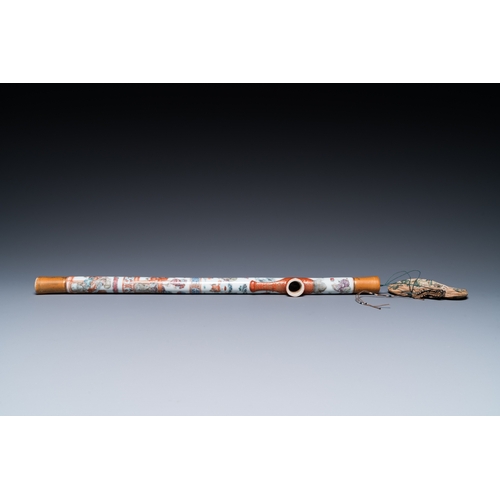 511 - A rare Chinese famille rose opium pipe with narrative scenes, 19th C.L.: 53 cm
 
 Provenance: A Belg... 