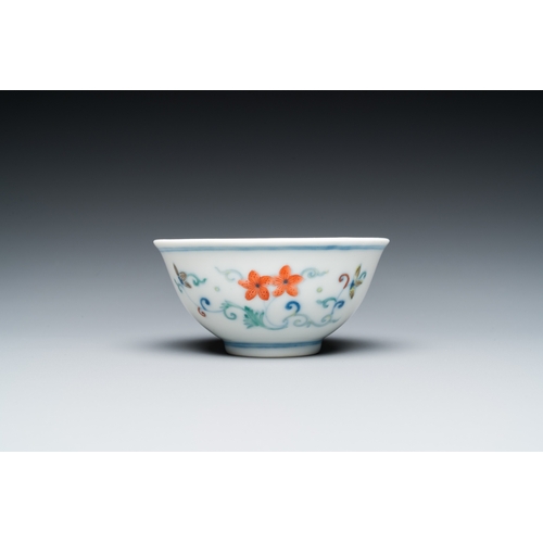 521 - A Chinese doucai bowl with floral design, Yongzheng mark and possibly of the periodDia.: 9 cm - H.: ... 