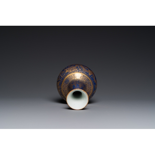 526 - A Chinese monochrome blue gilt-decorated 'dragons' bottle vase, Qianlong mark, 19th C.H.: 22 cm... 