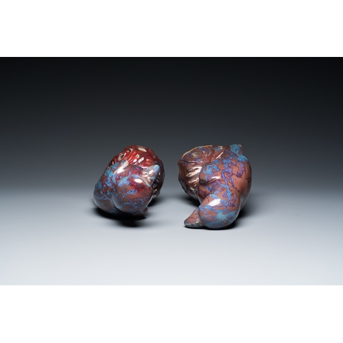 550 - A pair of Chinese flambe-glazed birds, 19th C.H.: 25 cm