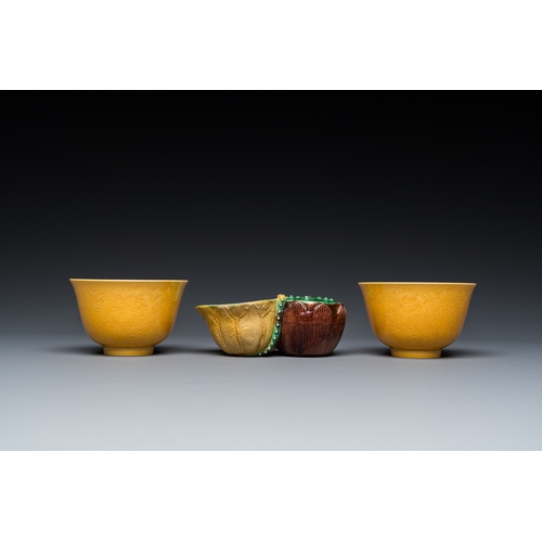 580 - A Chinese sancai-glazed water dropper and a pair of yellow-glazed anhua 'dragon' bowls, Xianfeng mar... 