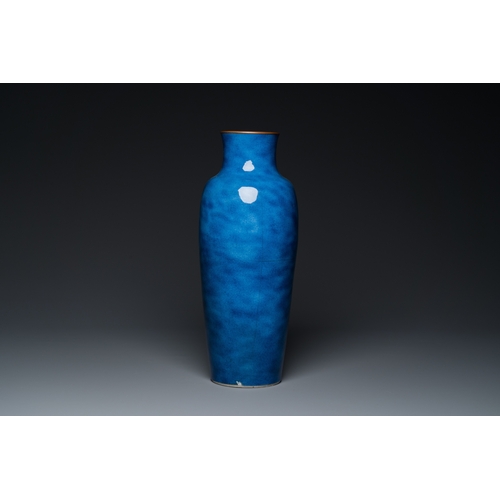 581 - A Chinese powder-blue vase with copper-mounted rim, Xuande mark, KangxiH.: 43,5 cm