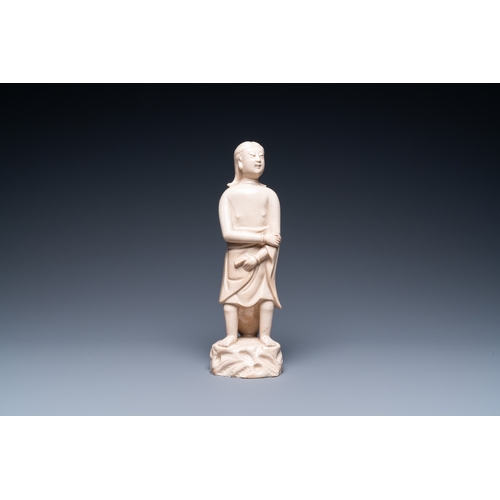 586 - A Chinese monochrome soft paste sculpture of Adam, KangxiH.: 23 cm