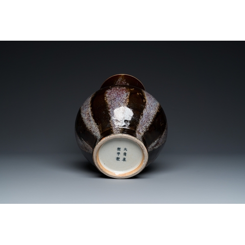 589 - A Chinese brown-flambe-glazed 'hu' vase, Kangxi mark, 19th C.H.: 33 cm