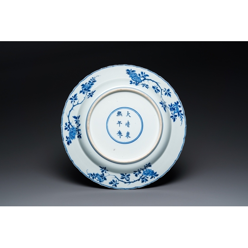 616 - A Chinese blue and white 'four seasons' dish, Kangxi mark and of the periodDia.: 35,5 cm... 