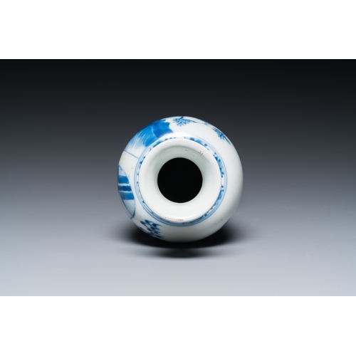 626 - A Chinese blue and white 'two ladies and a boy' vase, KangxiH.: 20,5 cm