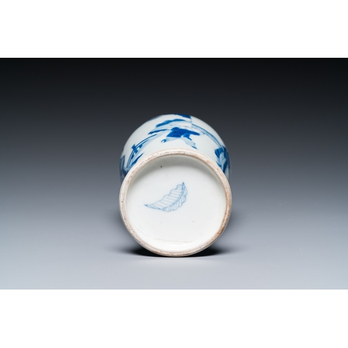 626 - A Chinese blue and white 'two ladies and a boy' vase, KangxiH.: 20,5 cm