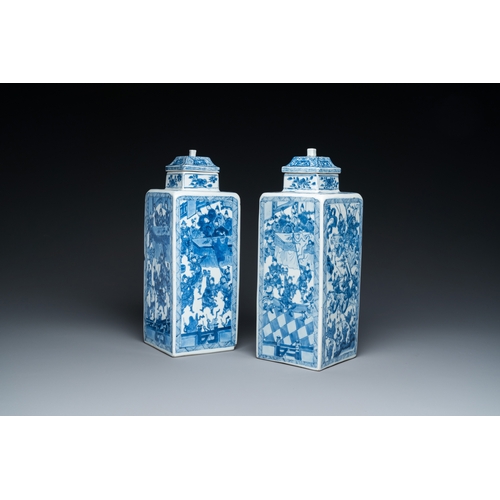 641 - A pair of Chinese blue and white square 'narrative subject' vases and covers, KangxiH.: 31 cm
 Ref.:... 