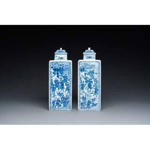 641 - A pair of Chinese blue and white square 'narrative subject' vases and covers, KangxiH.: 31 cm
 Ref.:... 