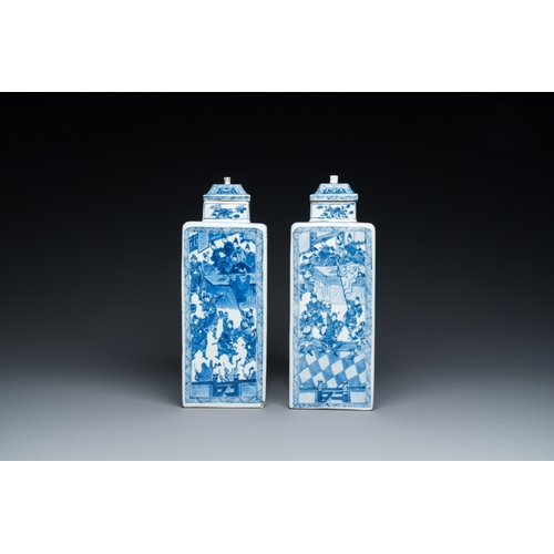 641 - A pair of Chinese blue and white square 'narrative subject' vases and covers, KangxiH.: 31 cm
 Ref.:... 