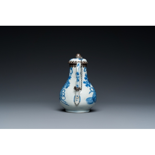 642 - A Chinese blue and white teapot and cover with silver mounts, KangxiH.: 13 cm