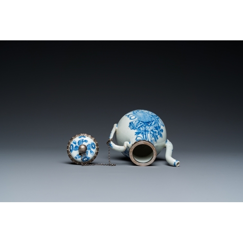 642 - A Chinese blue and white teapot and cover with silver mounts, KangxiH.: 13 cm