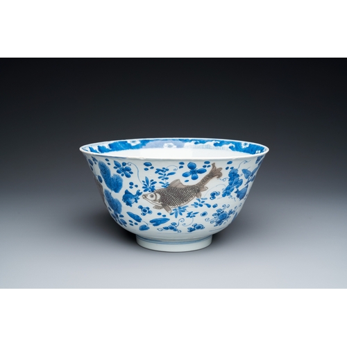 646 - A Chinese blue, white and copper-red 'carps' bowl, KangxiDia.: 25 cm - H.: 13 cm