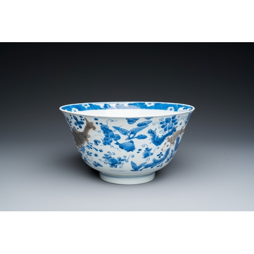 646 - A Chinese blue, white and copper-red 'carps' bowl, KangxiDia.: 25 cm - H.: 13 cm