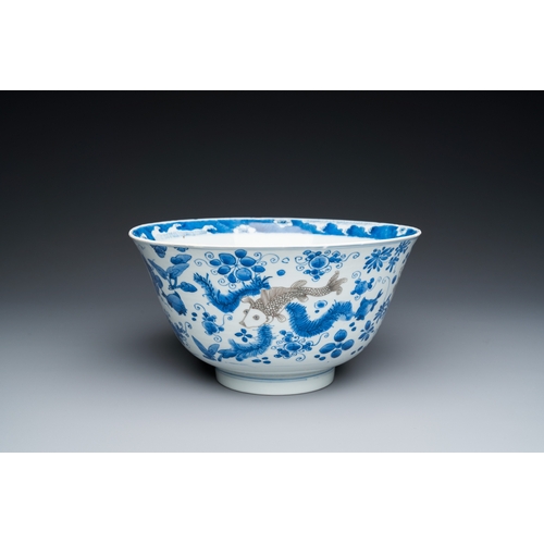 646 - A Chinese blue, white and copper-red 'carps' bowl, KangxiDia.: 25 cm - H.: 13 cm