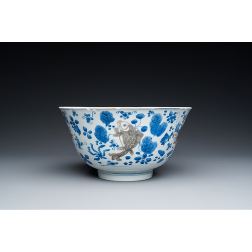 646 - A Chinese blue, white and copper-red 'carps' bowl, KangxiDia.: 25 cm - H.: 13 cm