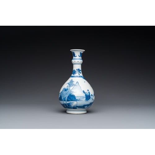 648 - A Chinese blue and white bottle vase with figures in a landscape, KangxiH.: 19 cm