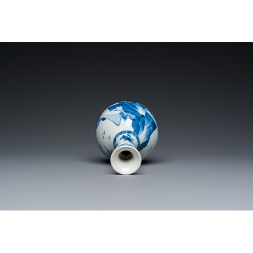 648 - A Chinese blue and white bottle vase with figures in a landscape, KangxiH.: 19 cm