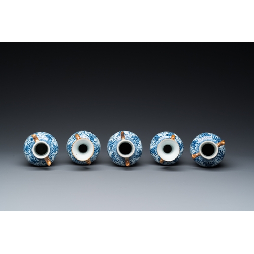 650 - A Chinese blue and white garniture of five vases with floral design, KangxiH.: 18 cm (the tallest)... 