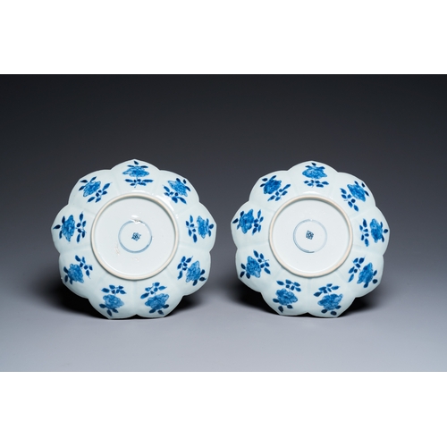 653 - A pair of Chinese blue and white lotus-shaped 'leopard' dishes, KangxiDia.: 22 cm