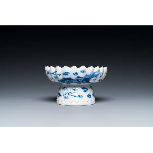 660 - A Chinese blue and white bottle vase, a tazza and a pair of famille rose cups and saucers, Kangxi an... 