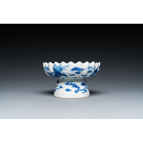 660 - A Chinese blue and white bottle vase, a tazza and a pair of famille rose cups and saucers, Kangxi an... 