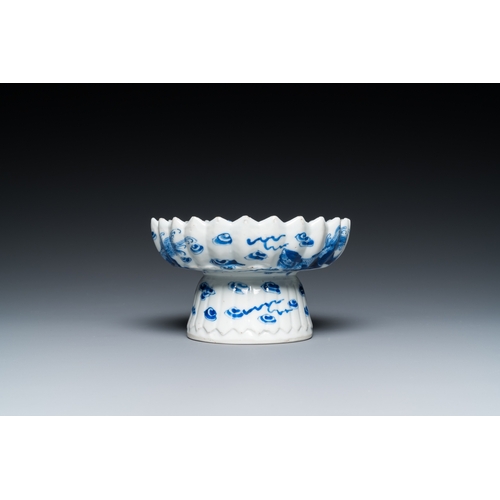 660 - A Chinese blue and white bottle vase, a tazza and a pair of famille rose cups and saucers, Kangxi an... 