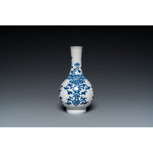 660 - A Chinese blue and white bottle vase, a tazza and a pair of famille rose cups and saucers, Kangxi an... 