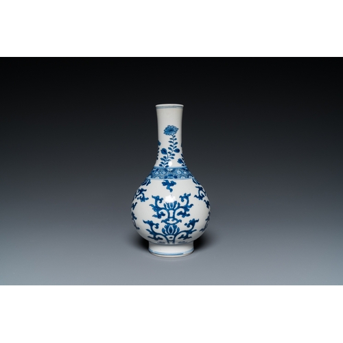 660 - A Chinese blue and white bottle vase, a tazza and a pair of famille rose cups and saucers, Kangxi an... 