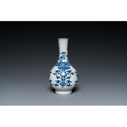 660 - A Chinese blue and white bottle vase, a tazza and a pair of famille rose cups and saucers, Kangxi an... 