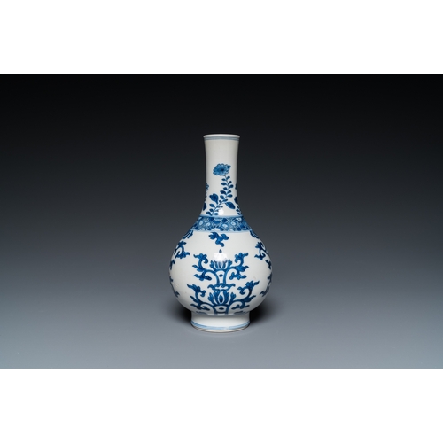 660 - A Chinese blue and white bottle vase, a tazza and a pair of famille rose cups and saucers, Kangxi an... 