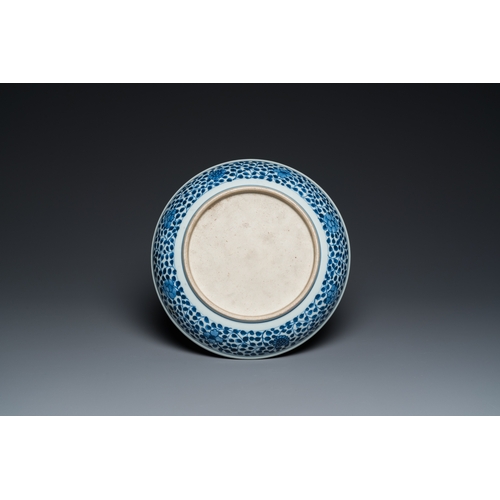 688 - A Chinese blue and white Ming-style 'flower bouquet' dish, QianlongDia.: 28 cm