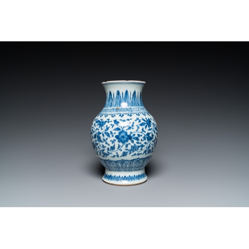 690 - A Chinese blue and white Ming-style 'lotus scroll' vase, QianlongH.: 23,5 cm