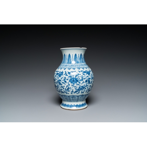 690 - A Chinese blue and white Ming-style 'lotus scroll' vase, QianlongH.: 23,5 cm