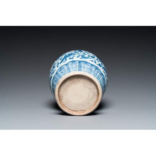 690 - A Chinese blue and white Ming-style 'lotus scroll' vase, QianlongH.: 23,5 cm