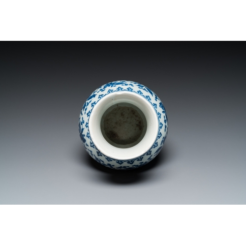 690 - A Chinese blue and white Ming-style 'lotus scroll' vase, QianlongH.: 23,5 cm