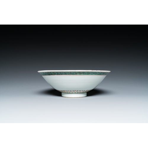 697 - A Chinese famille verte 'magpies and prunus' bowl, KangxiDia.: 21 cm - H.: 7,5 cm