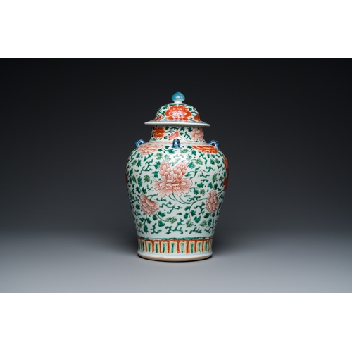 698 - A Chinese 'peony scroll' famille verte vase and cover, KangxiH.: 38 cm