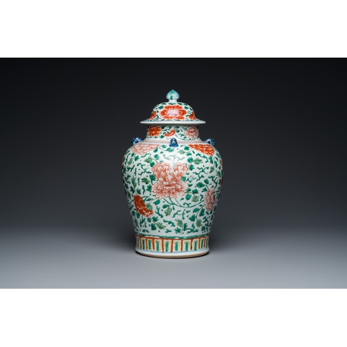 698 - A Chinese 'peony scroll' famille verte vase and cover, KangxiH.: 38 cm